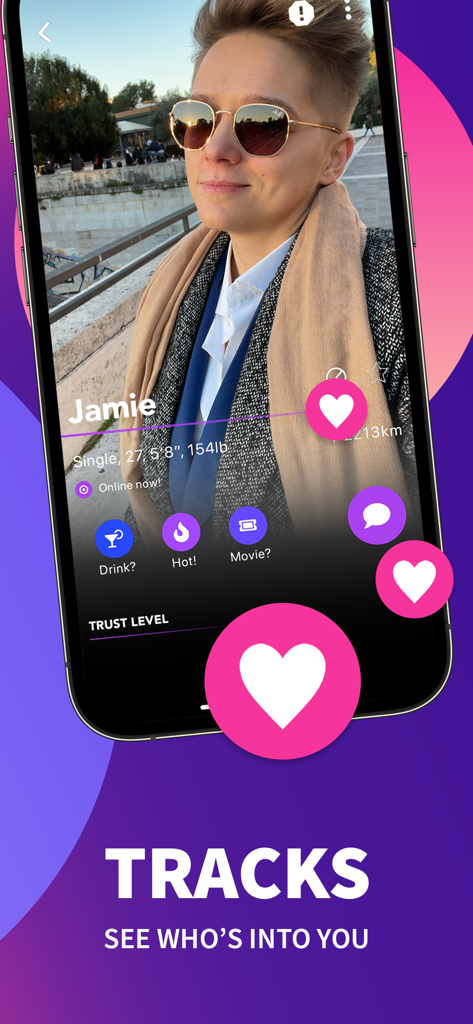 Wapa: Lesbian Dating & Chat - Mobile screen of Wapa dating app showing a user profile and the Tracks feature to see who has viewed you.