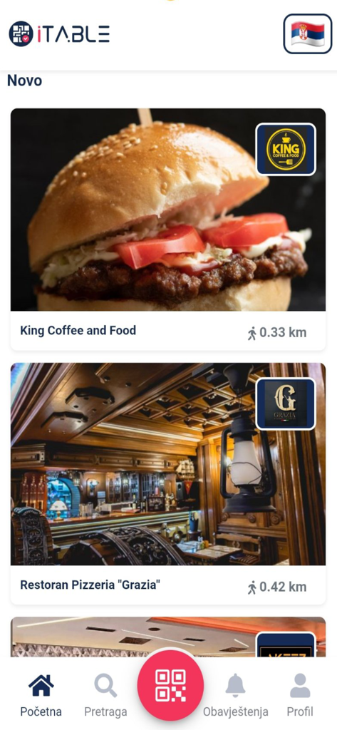 iTable App - iTable app home screen displaying local restaurants with distances and a central QR code scan button