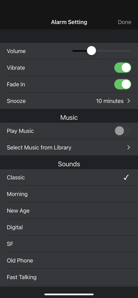 Interface for customizing alarm settings including volume, vibration, fade-in effect, and sound selection.