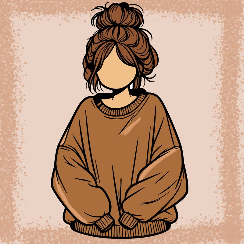 girl with a baggy sweatshirt and messy bun