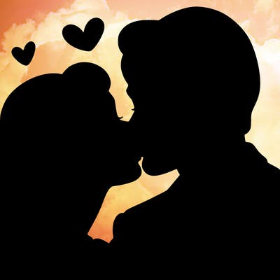 woman and man kissing