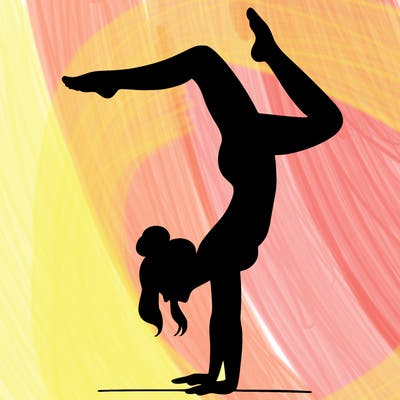 a woman doing a handstand