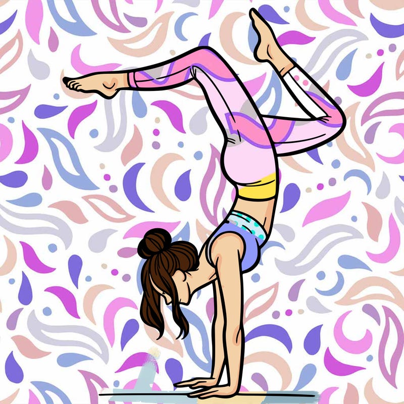 a woman doing a handstand