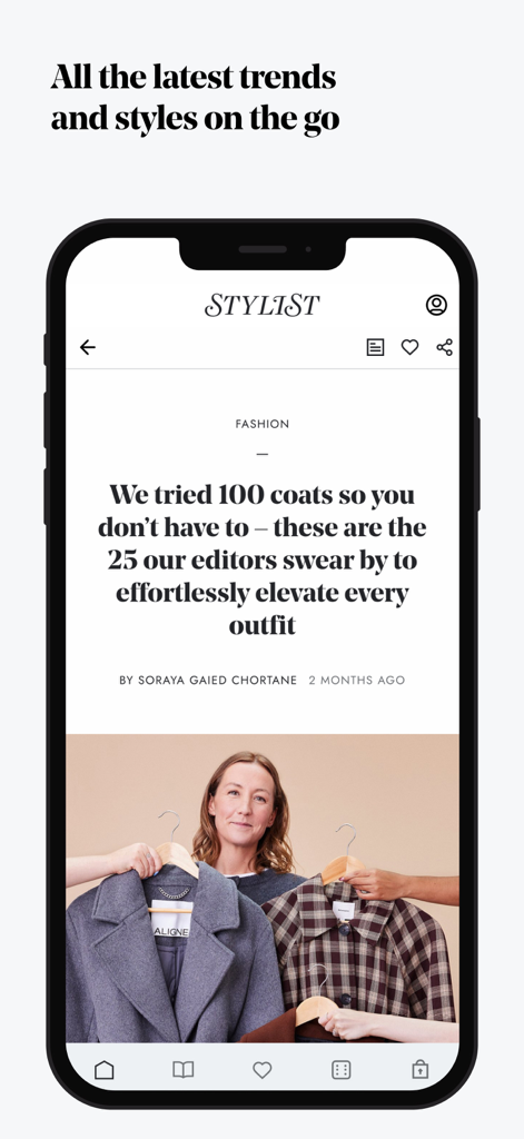 Stylist: Fashion, Beauty, News - Um telefone móvel exibindo um artigo de moda no aplicativo Stylist sobre as principais tendências de casacos
