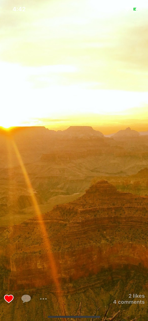 A sunset photo of the Grand Canyon shared on the Tripcast app with likes and comments