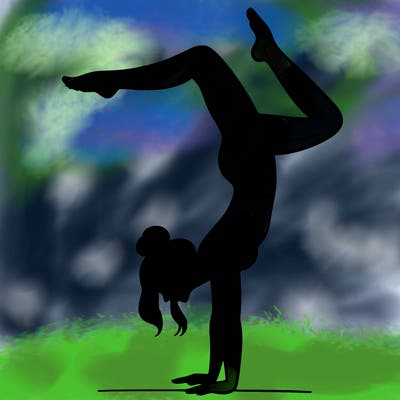 a woman doing a handstand