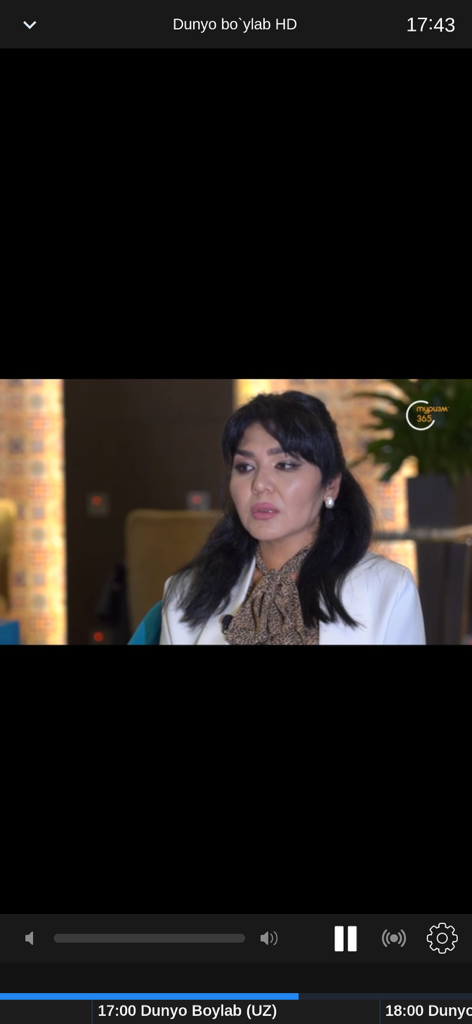 TelecomTV: uz TV online - Video player interface of the TelecomTV app streaming an Uzbek television channel