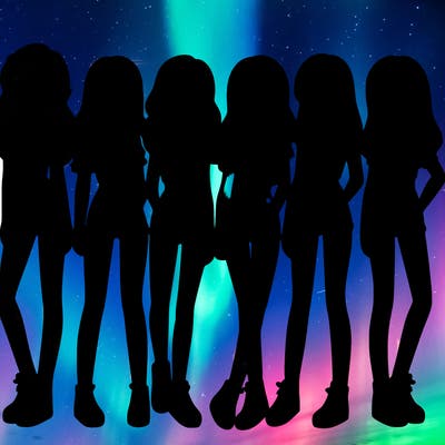 a group of girls wearing crop tops and shorts