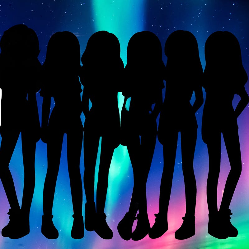 a group of girls wearing crop tops and shorts