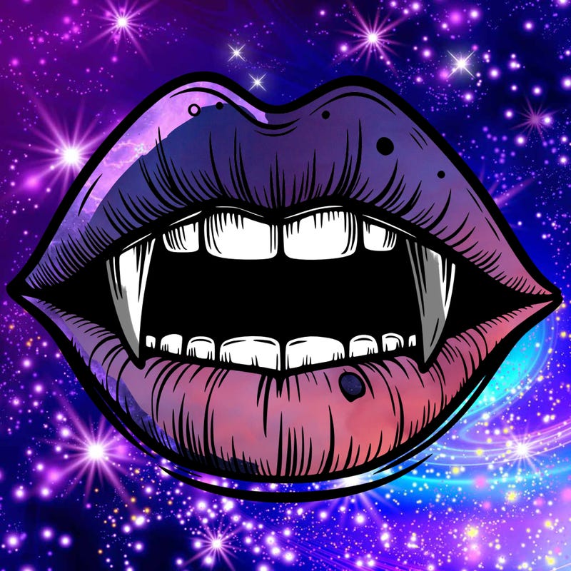 lips with vampire teeth