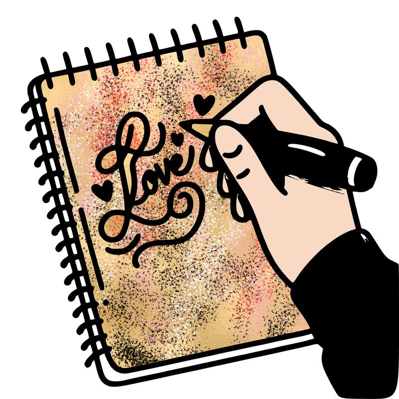 a hand writing “love” in calligraphy on a notebook