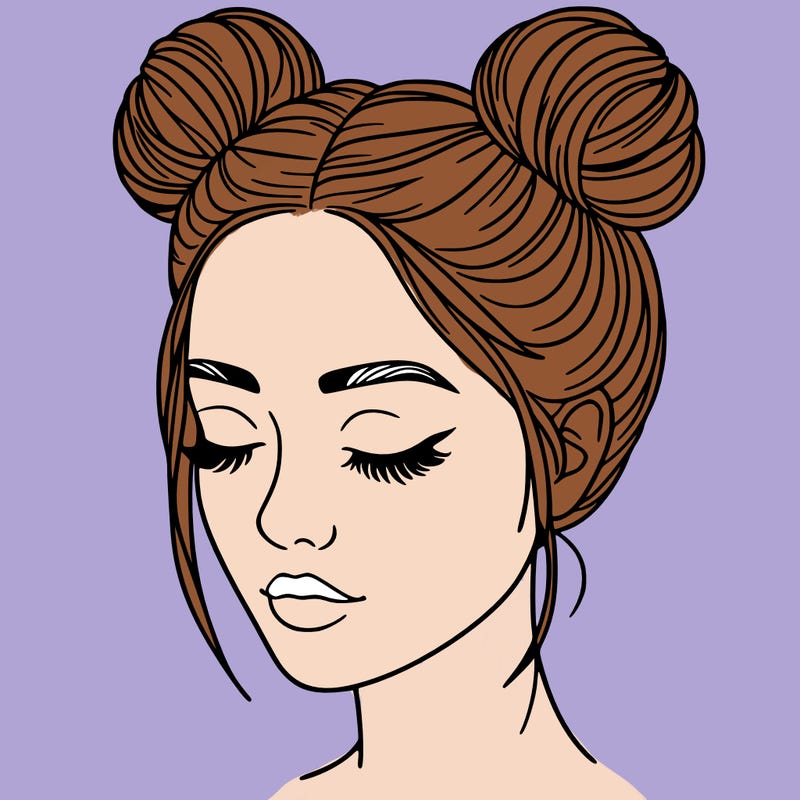 woman with hair buns