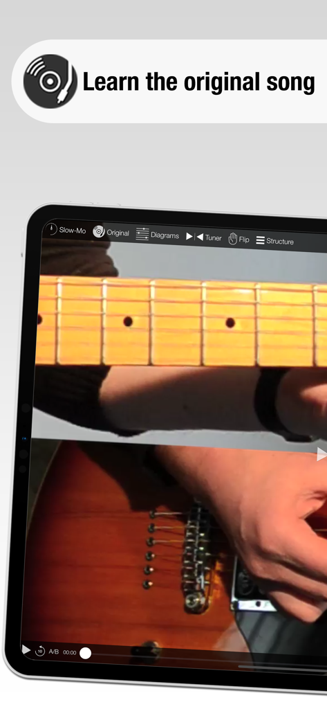 Guitar Masterclass - App Guitar Masterclass su un iPad che mostra una lezione video per imparare canzoni originali