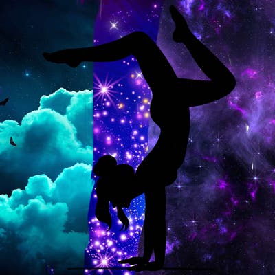 a woman doing a handstand