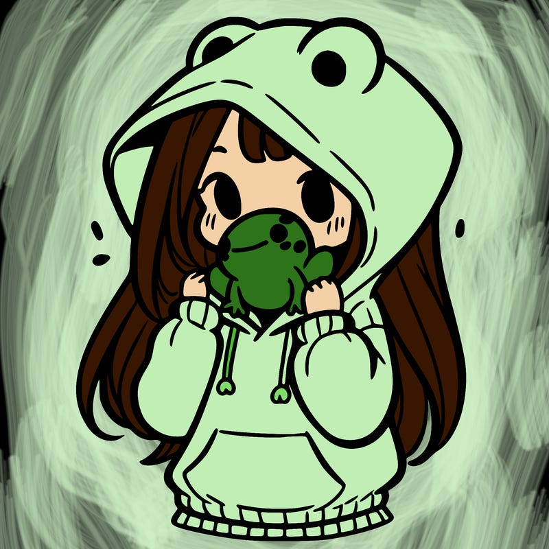 a girl holding a froggy hoodie