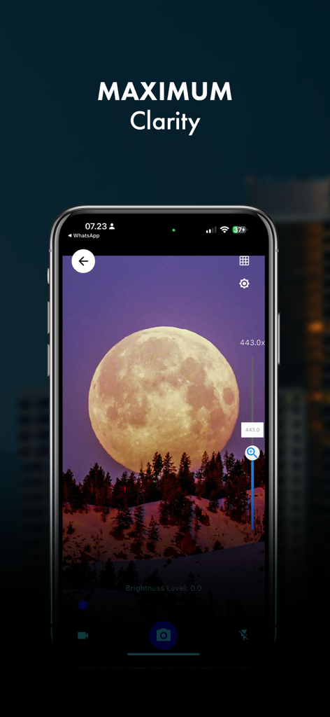 Mega Zoom Telescope Camera HD - A smartphone screen displaying a highly zoomed-in view of a large moon over a winter forest landscape using the telescope camera app