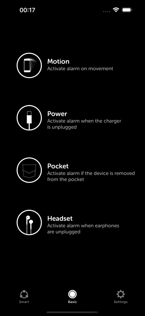 Interfaz de la aplicación iAntiTheft mostrando los modos de alarma de seguridad de Movimiento, Carga, Bolsillo y Auriculares.