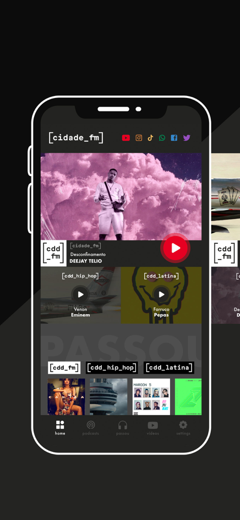 Ecrã inicial da aplicação Cidade FM mostrando diferentes canais de rádio e sucessos musicais em tendência.
