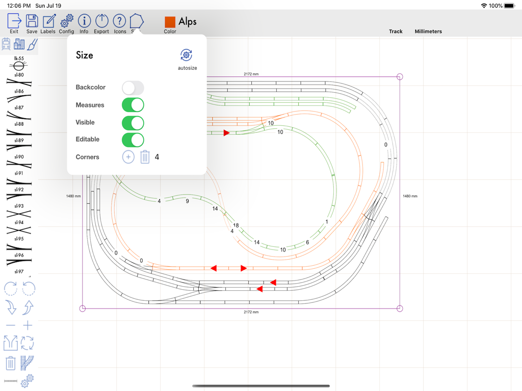 TrainDesign - Model railroad track layout with size settings menu and measurements on an iPad