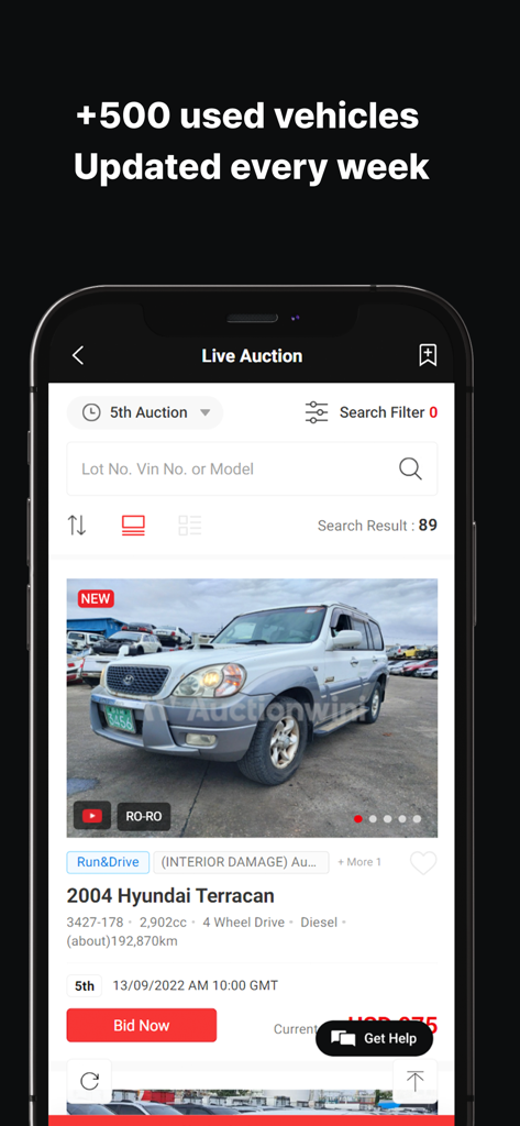 A mobile screen showing a live car auction for a 2004 Hyundai Terracan with a bid now button