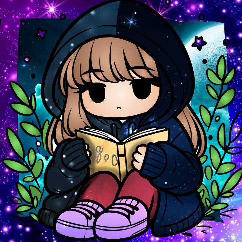 girl in oversized hoodie reading a book