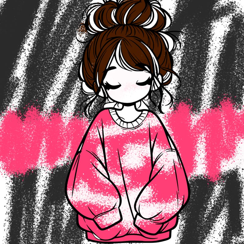 girl with baggy sweatshirt and messy bun