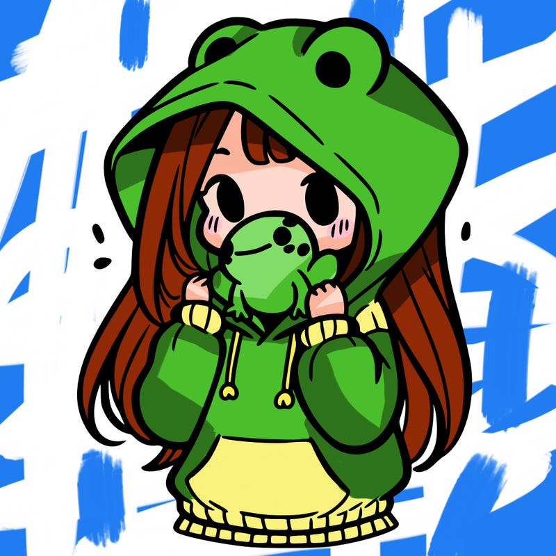 a girl holding a froggy hoodie