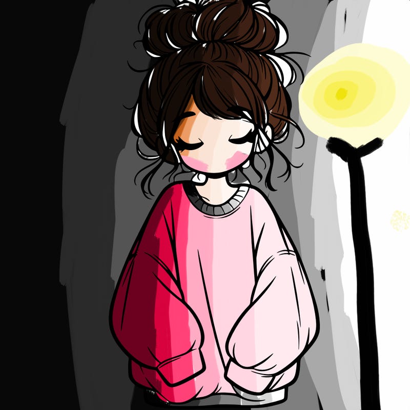 girl with baggy sweatshirt and messy bun