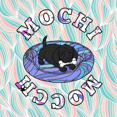 beagle puppy in a bed with a toy in her mouth that says in big letters around the dog bed says mochi