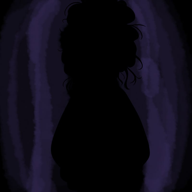 girl with baggy sweatshirt and messy bun