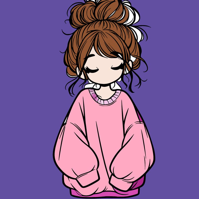 girl with baggy sweatshirt and messy bun