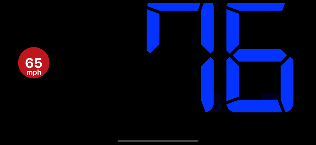Digital speedometer showing 76 mph with a 65 mph speed limit warning in landscape mode