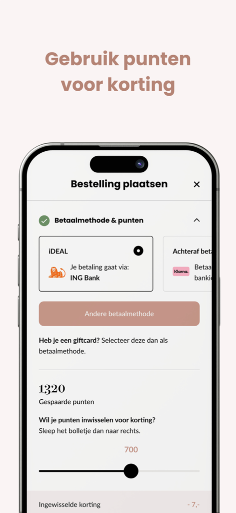 Babypark-App-Kassenbildschirm, der einen Schieberegler zur Einlösung von Treuepunkten für einen Rabatt und verfügbare Zahlungsmethoden wie iDEAL und Klarna zeigt