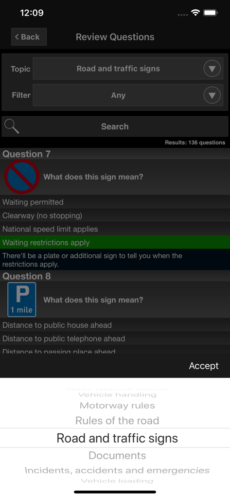 Review screen of the UK driving theory test app showing road and traffic sign practice questions.