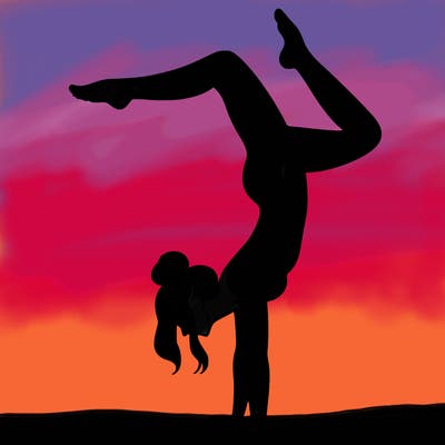 a woman doing a handstand