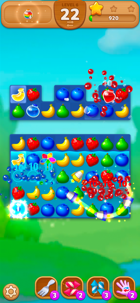 Fruits Mania:Belle's Adventure - Jugabilidad de Fruits Mania La Aventura de Belle mostrando un nivel de puzzle match-3 con frutas coloridas y potenciadores.