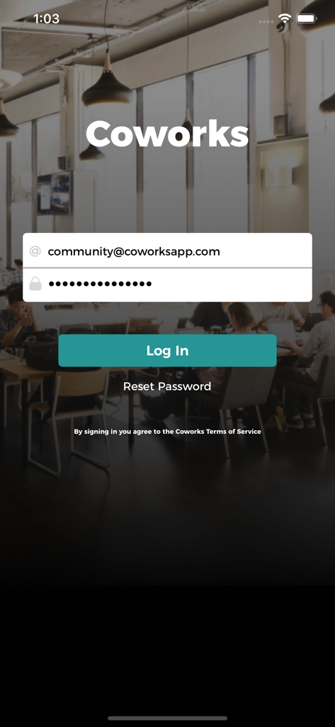 Login screen of the Coworks app showing email and password fields over a coworking space background