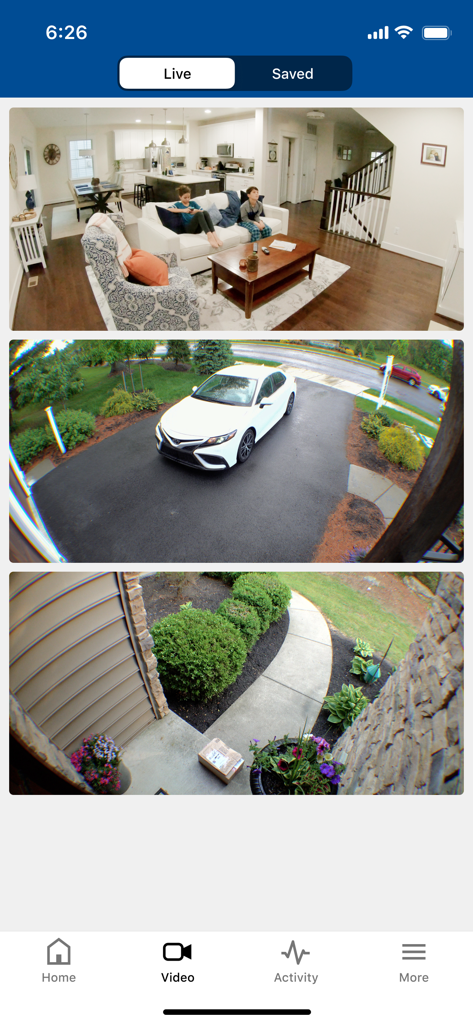 apiALARM - Live video security feeds of a living room driveway and front porch on the apiALARM mobile app interface