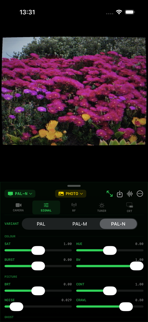 AnalogTV - AnalogTV app interface showing signal modulation controls including PAL variants and sliders for saturation, hue, and noise over a CRT filtered image.