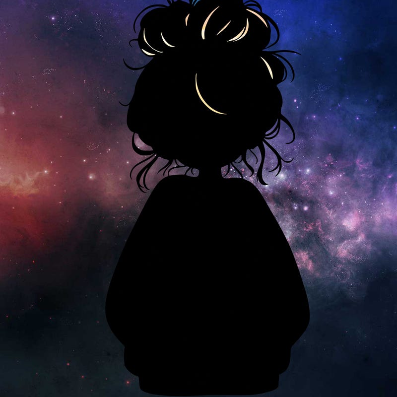 girl with baggy sweatshirt and messy bun