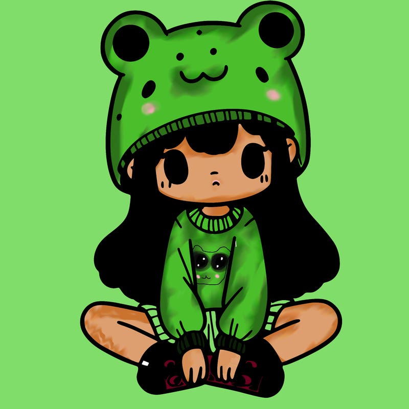 a girl wearing a frog hat and some frog socks