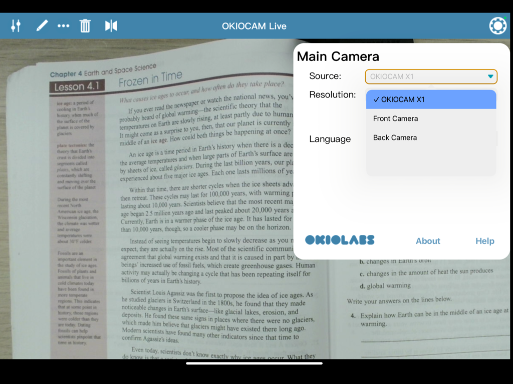 OKIOCAM Live app interface showing camera source selection menu over a science textbook page on an iPad