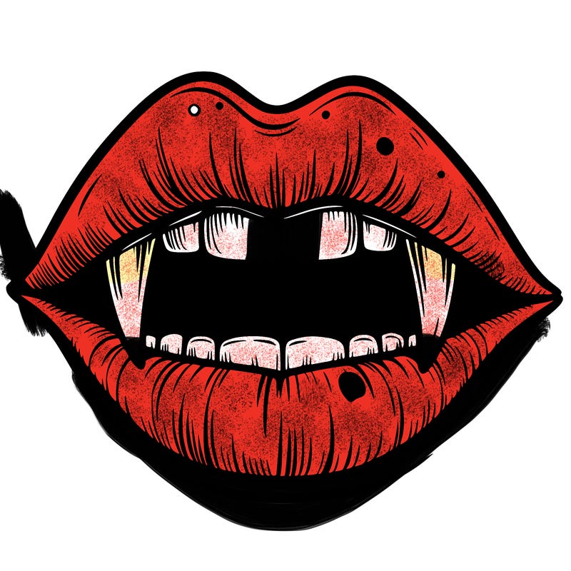 lips with vampire teeth