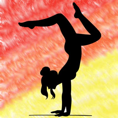 a woman doing a handstand