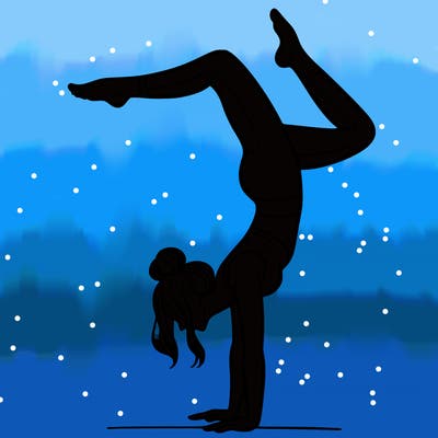 a woman doing a handstand