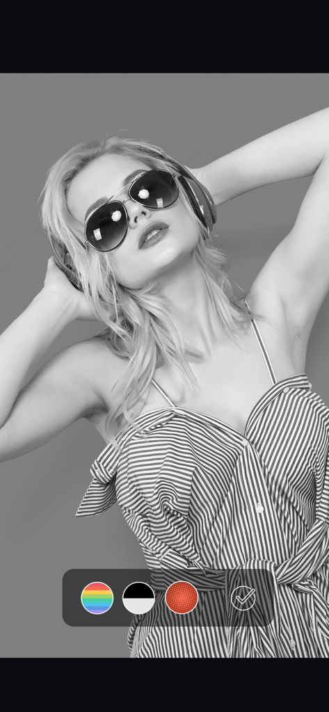 Breeze Booth - A woman in a black and white photo booth filter using the Breeze Booth app interface.