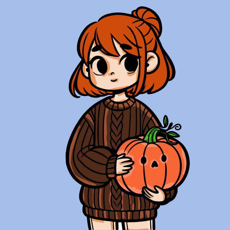 girl wearing a sweater holding a pumpkin