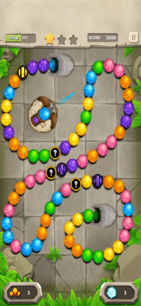 Gameplay of Marble Mission showing colorful marbles on a winding stone path
