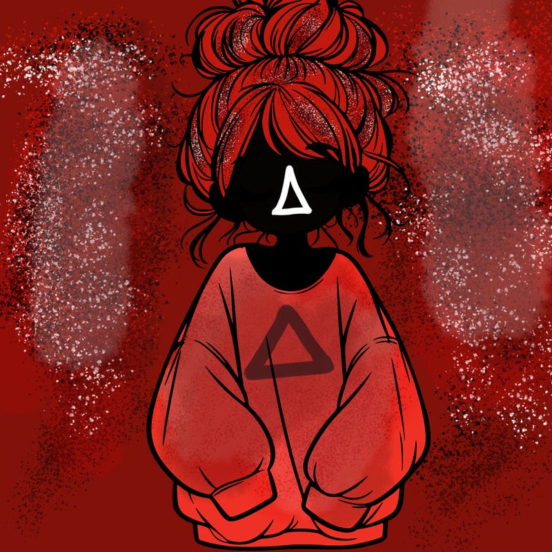 girl with baggy sweatshirt and messy bun