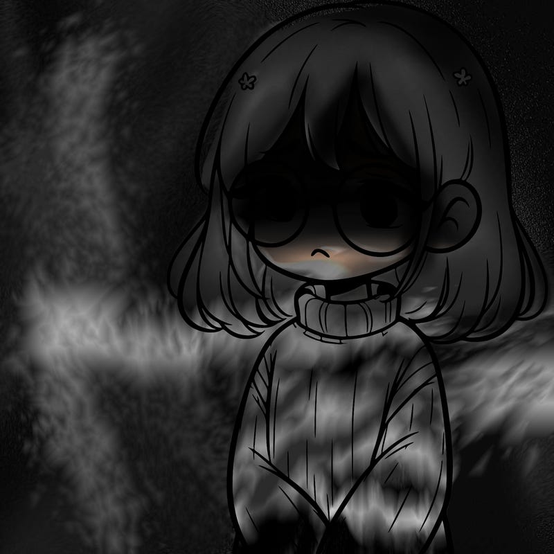 sad girl with glasses in a sweater